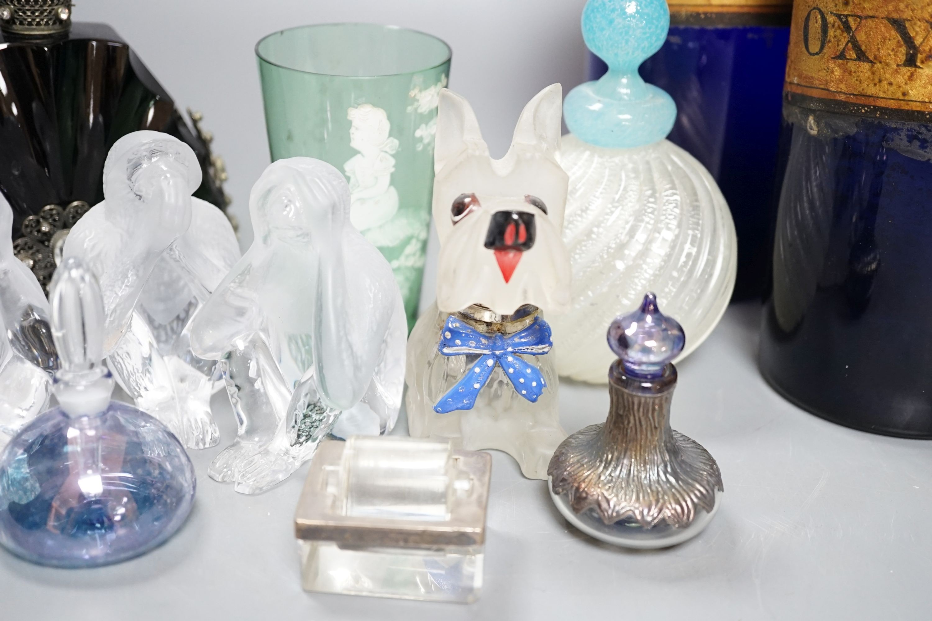 A pair of blue glass drug jars and a novelty glass dog inkwell etc, tallest 24 cms high